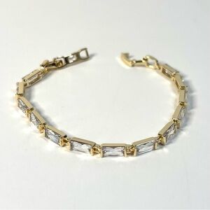 18k yellow gold-plated tennis bracelet with emerald cut stones